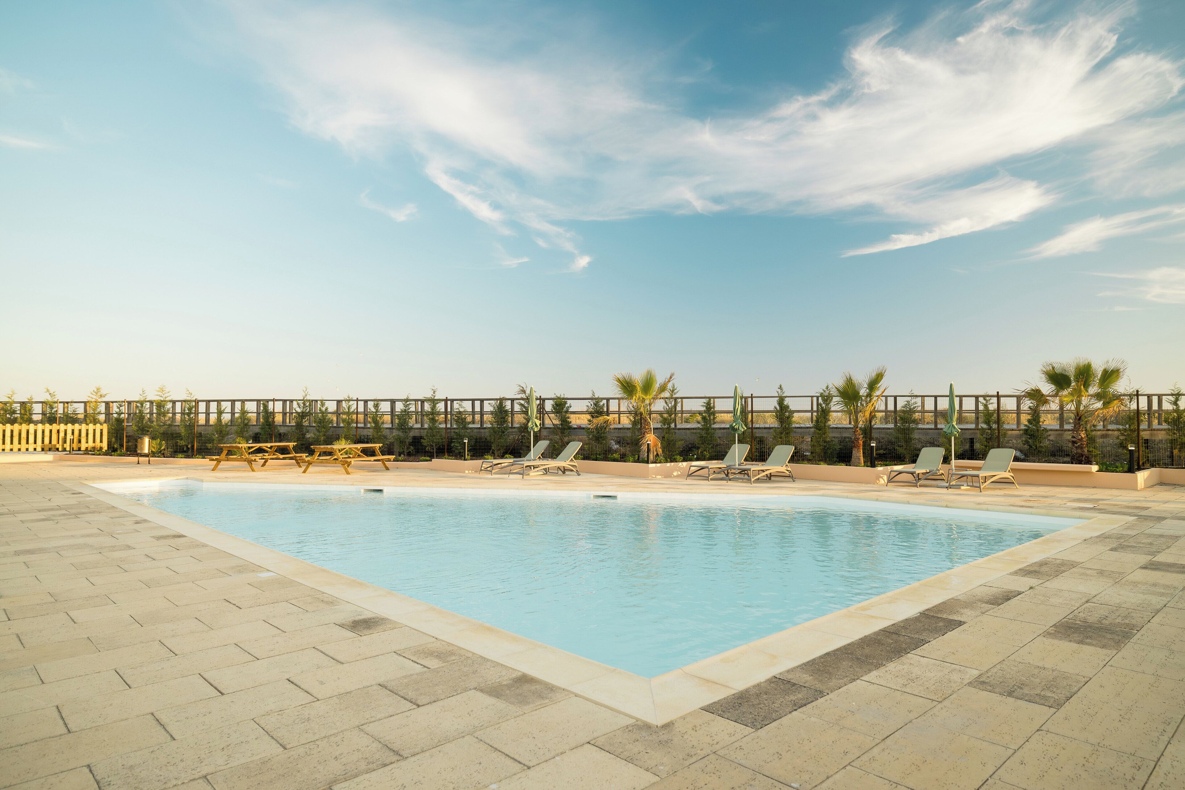 indoor pool, 2 outdoor pools, pool umbrellas, pool loungers