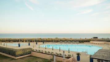 Indoor pool, 2 outdoor pools, pool umbrellas, sun loungers