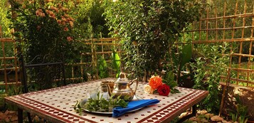 Quarto triplo conforto | Terraço/pátio