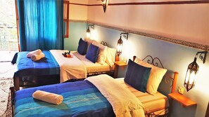 Quarto triplo conforto | Cortinas blackout, berços grátis, Wi-Fi de cortesia, roupa de cama