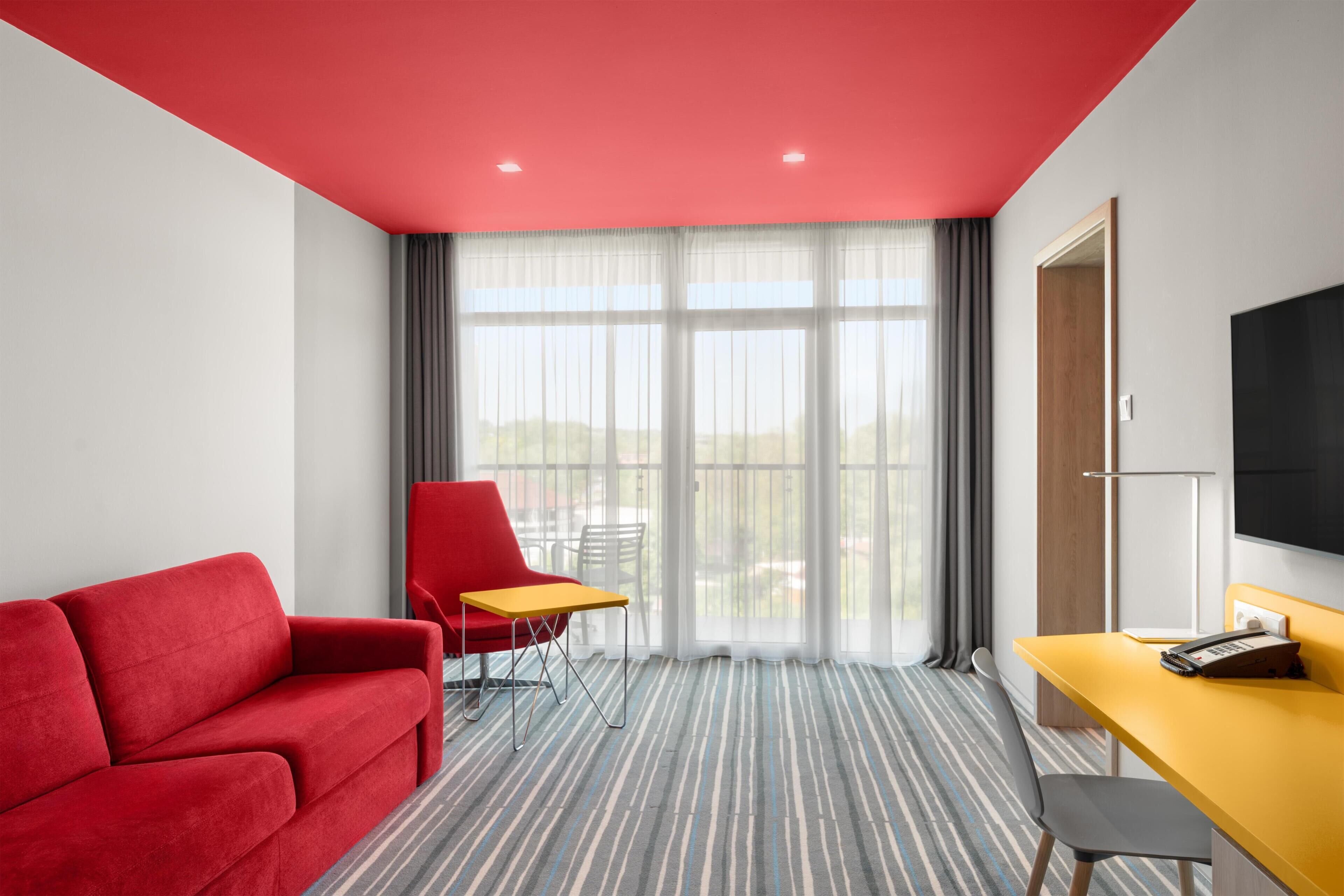Standard Suite, 1 Bedroom | Minibar, in-room safe, desk, soundproofing