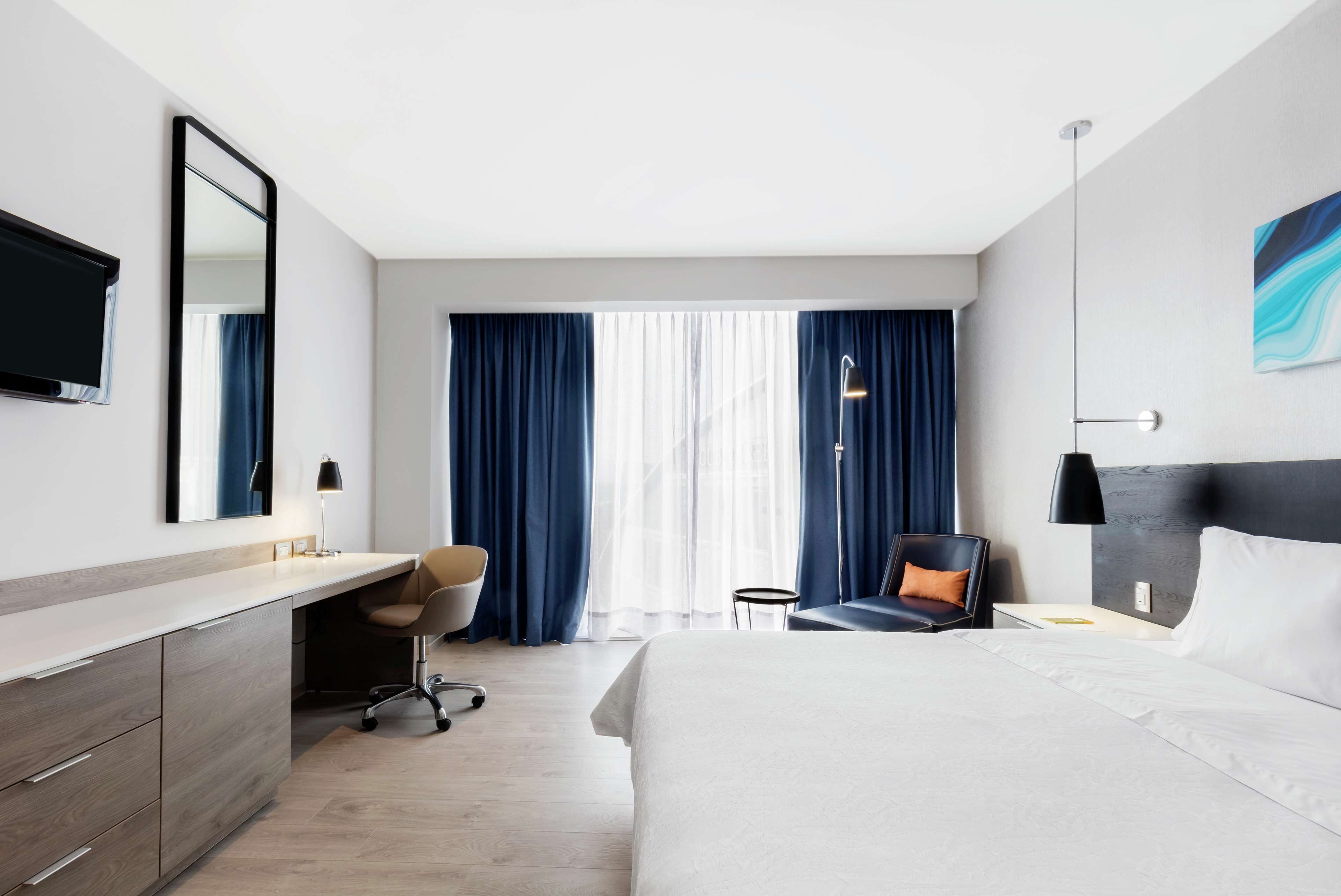 suite, 1 bedroom, non smoking | minibar, in-room safe, desk, blackout curtains