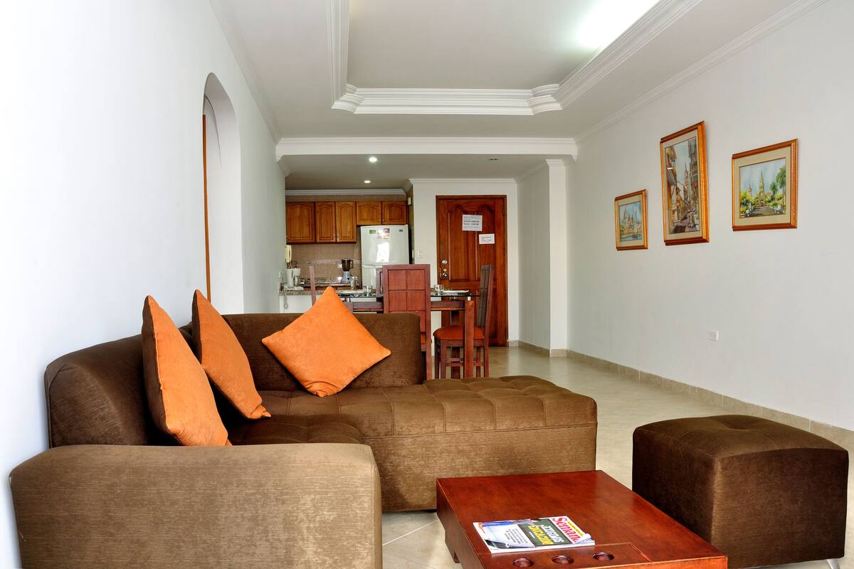 Standard Apartment, 2 Bedrooms | Living room | 32-inch flat-screen TV with cable channels, TV