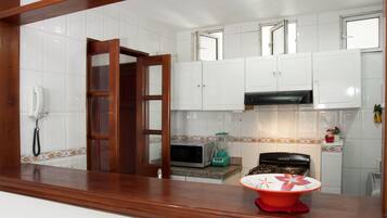 Standard Apartment, 2 Bedrooms | Private kitchen | Full-sized fridge, microwave, oven, stovetop
