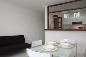 Standard Apartment, 2 Bedrooms | Living room | 32-inch flat-screen TV with cable channels, TV