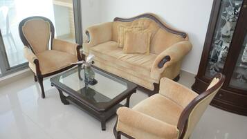 Superior Apartment Ocean View, 2 Bedrooms | Living room | Flat-screen TV