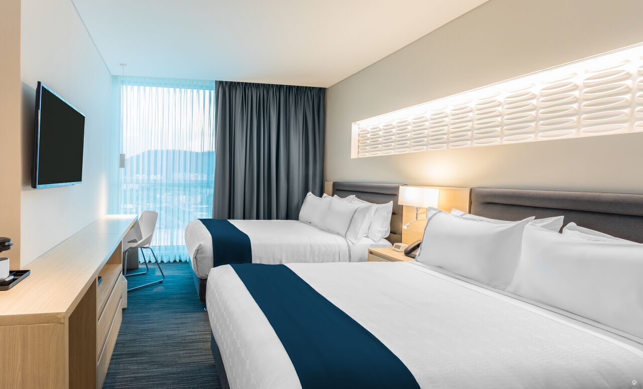 standard room, 2 queen beds | 1 bedroom, in-room safe, desk, laptop workspace