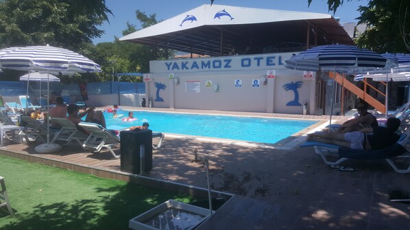 Outdoor pool, pool umbrellas, pool loungers