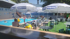 Outdoor pool, pool umbrellas, sun loungers