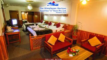 Deluxe Room | Living area | TV