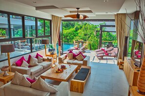6-Bedroom Pool Villa with Sea View | Living room | 75-inch flat-screen TV with satellite channels, TV