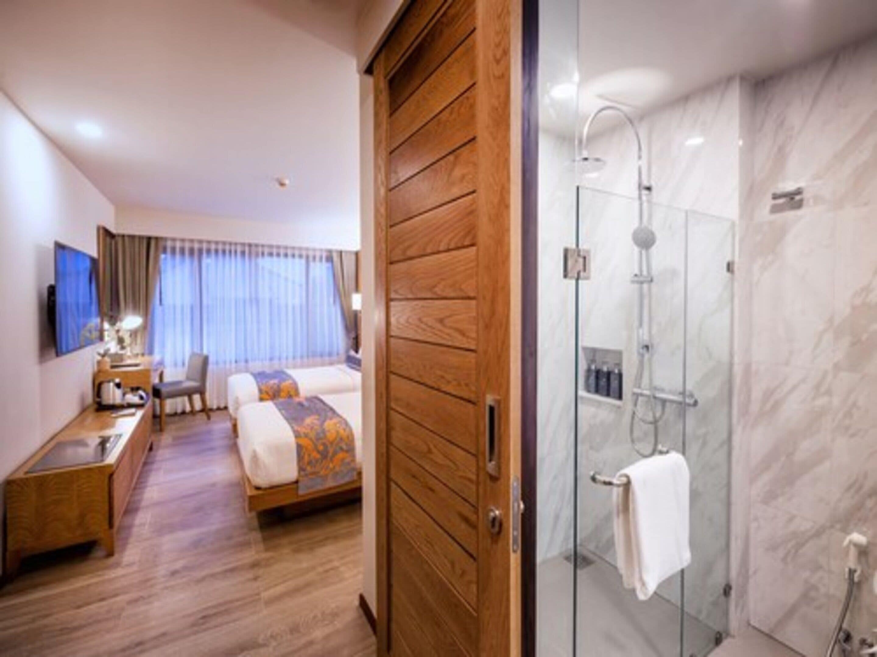 superior twin room, 2 single beds, non smoking, pool view | bathroom | free toiletries, hair dryer, bathrobes, slippers