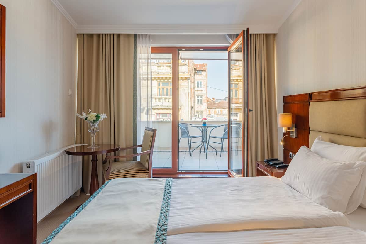 Superior Room with Balcony | 1 bedroom, memory foam beds, minibar, in-room safe
