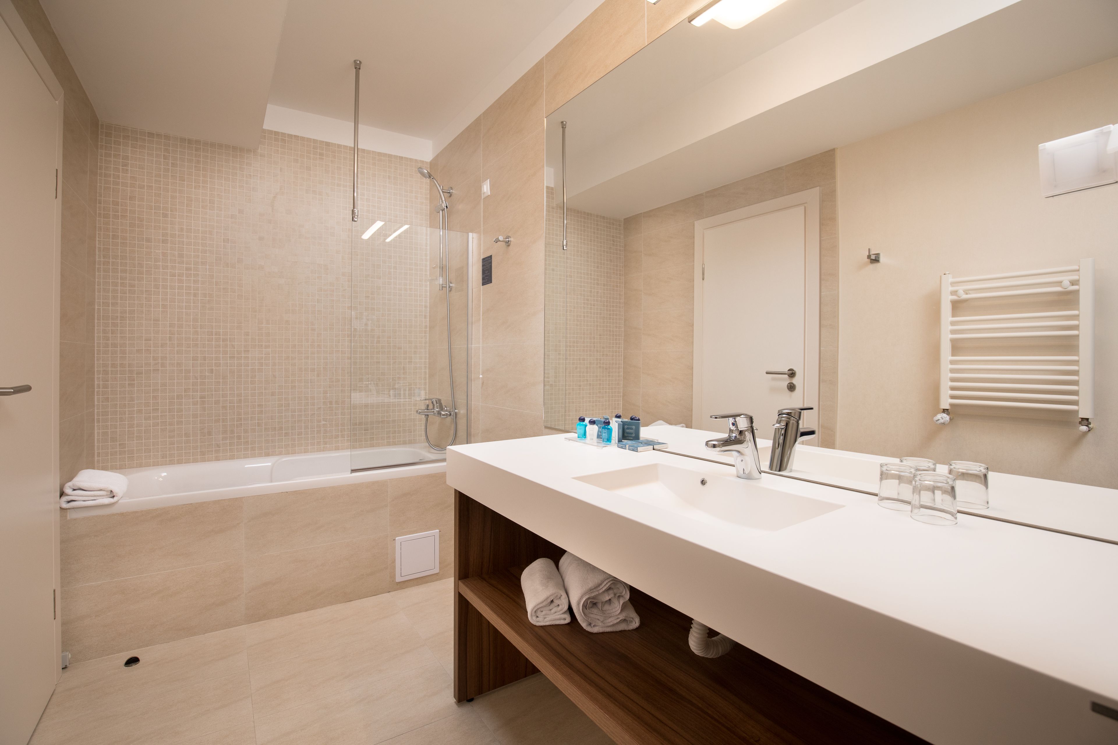 free toiletries, hair dryer, slippers, towels