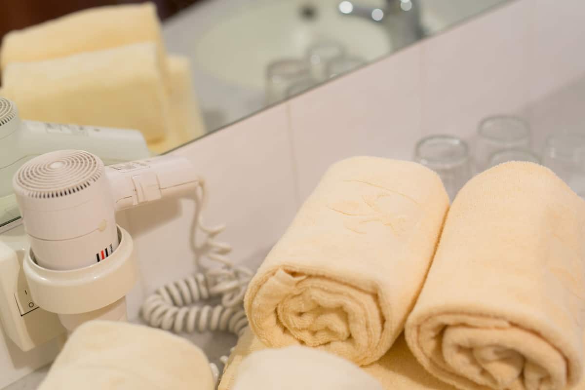 free toiletries, hair dryer, towels, shampoo