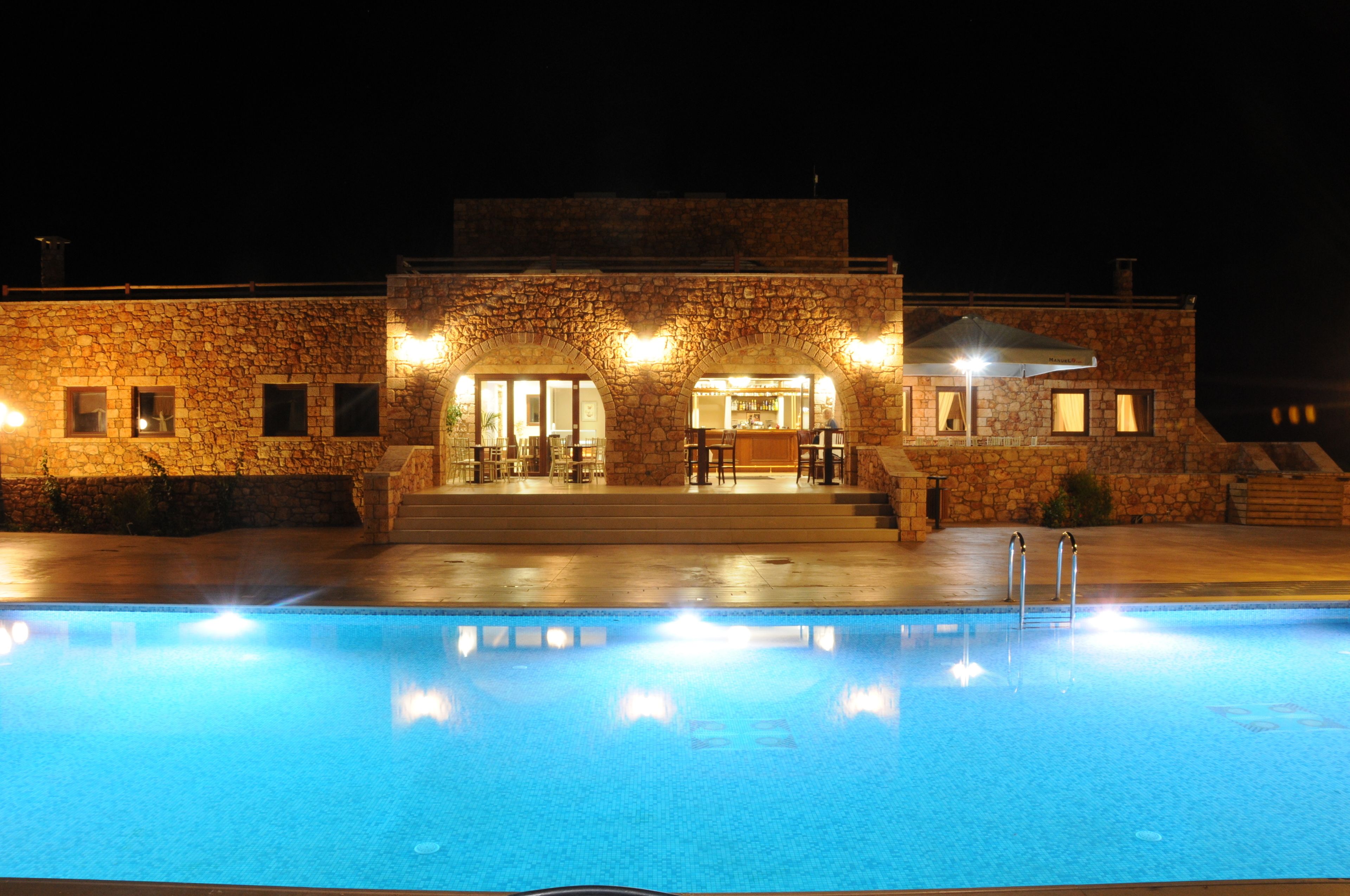 Seasonal outdoor pool, pool umbrellas, pool loungers