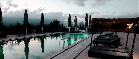 Seasonal outdoor pool, pool umbrellas, sun loungers