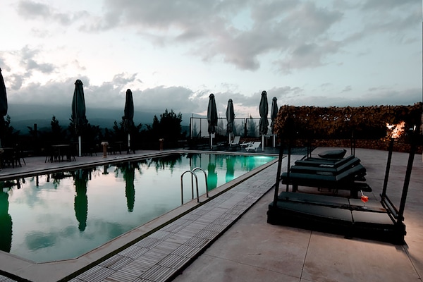Seasonal outdoor pool, pool umbrellas, pool loungers