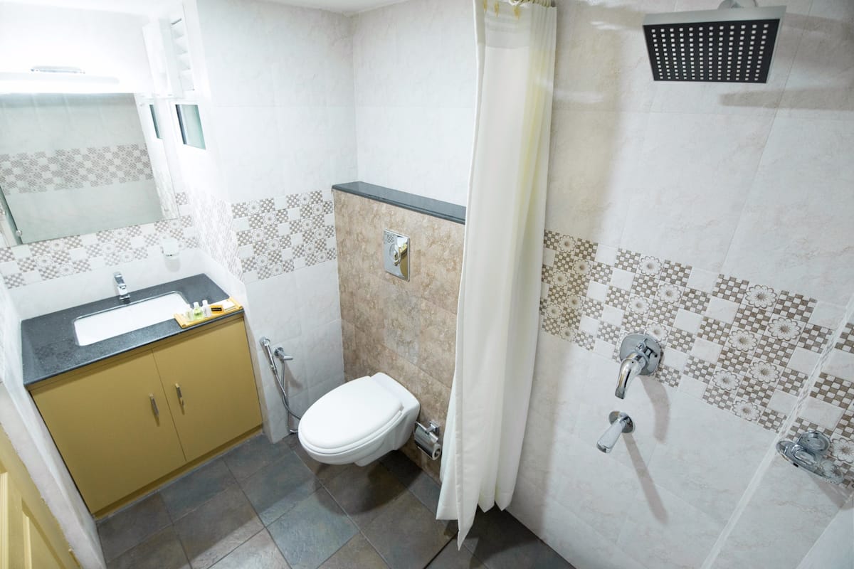 shower, rainfall showerhead, towels