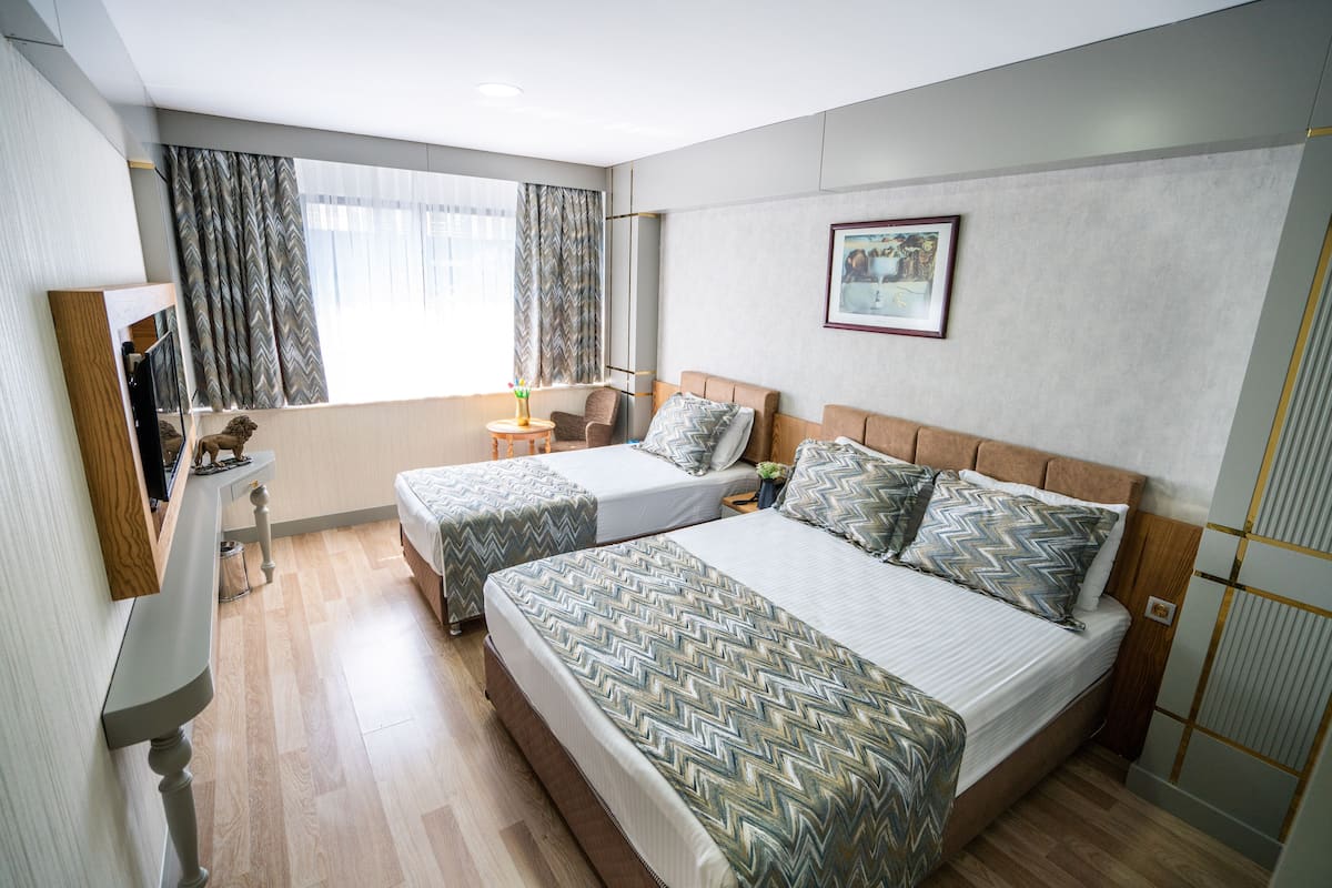 Zweibettzimmer | 2 Schlafzimmer, Minibar, Zimmersafe, schallisolierte Zimmer