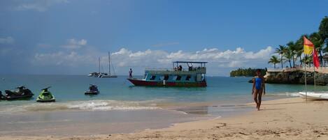 Beach nearby, white sand, sun loungers, beach umbrellas
