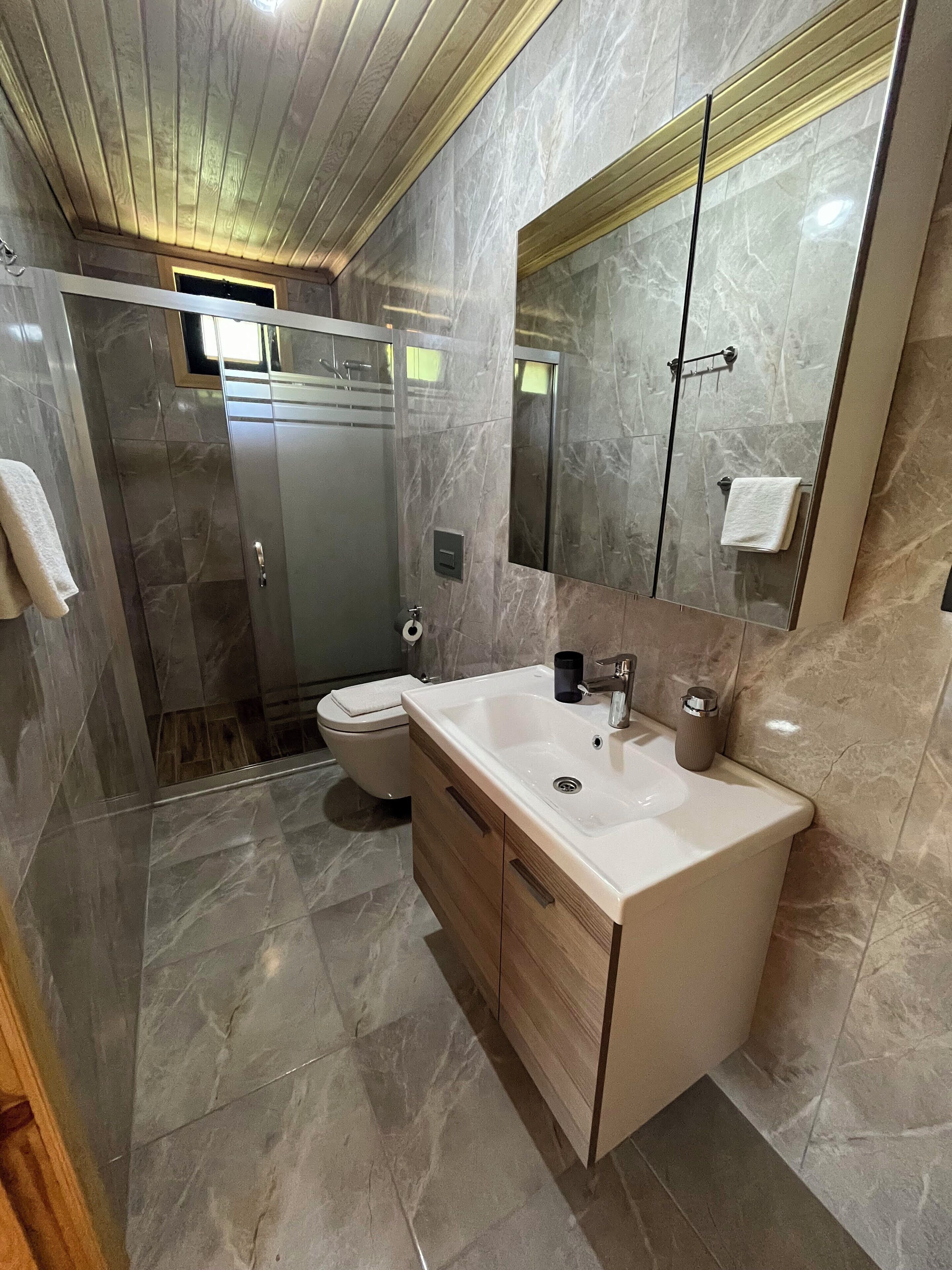 superior tree house | bathroom | shower, hair dryer, towels, soap