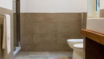 Apartment, 1 Bedroom | Bathroom | Shower, rainfall showerhead, free toiletries, hair dryer