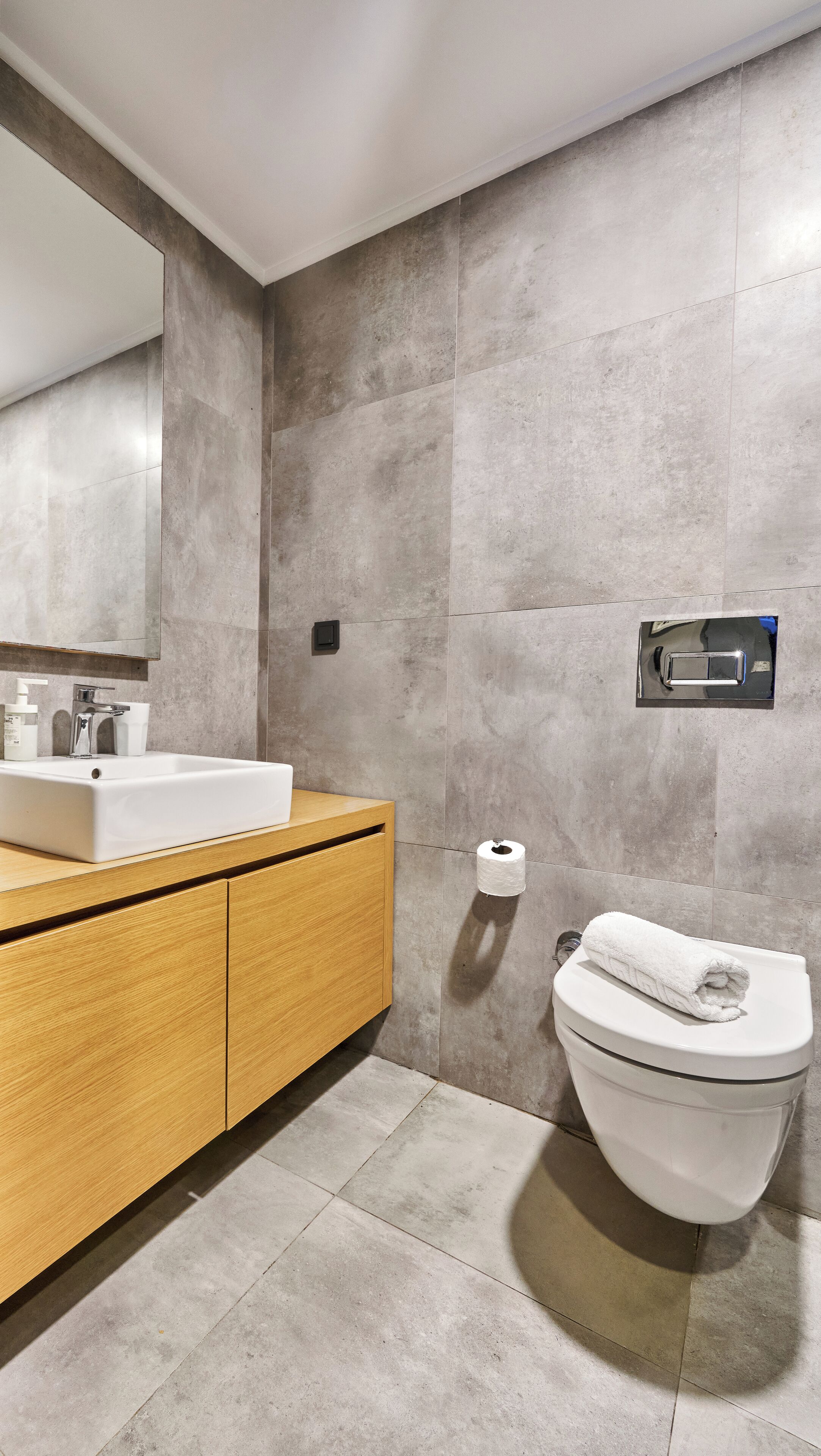 deluxe condo | bathroom | shower, hair dryer, slippers, towels