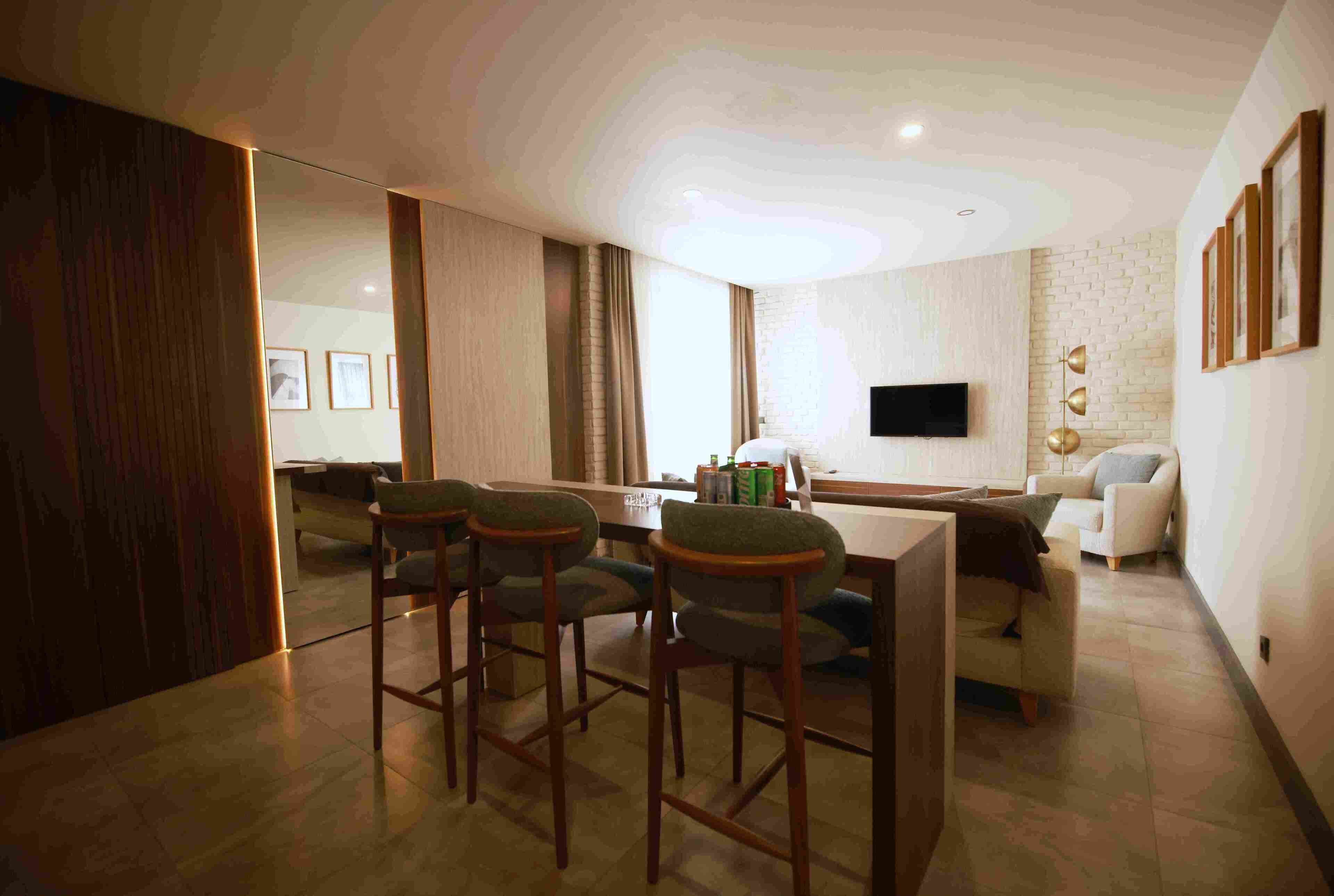 deluxe apartment, garden view | living room | lcd tv