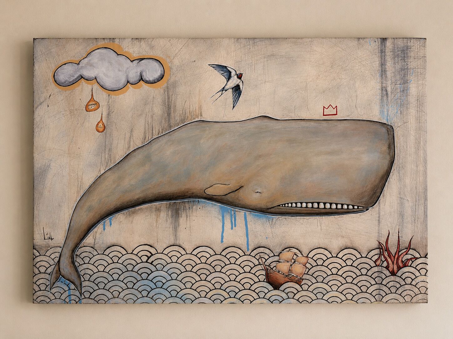 A whale, a bird, and a ship on a wooden background.