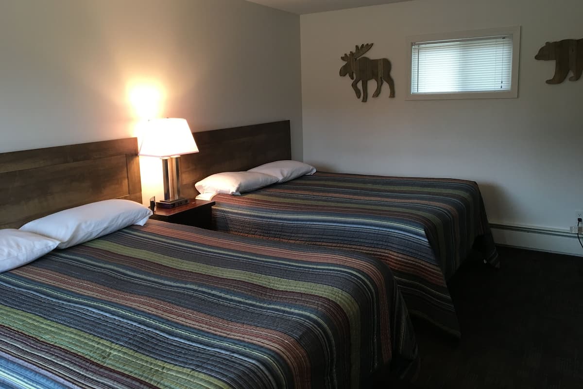 Standard Room, 2 Queen Beds, Refrigerator & Microwave (Room 11) | Laptop workspace, blackout drapes, free WiFi, bed sheets