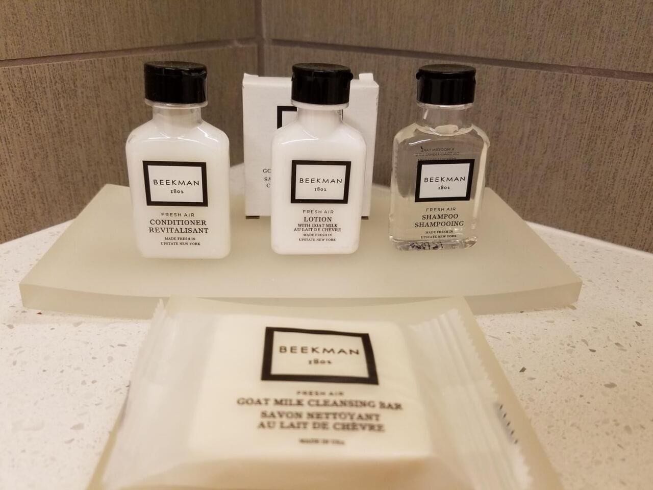 shower, designer toiletries, hair dryer, towels