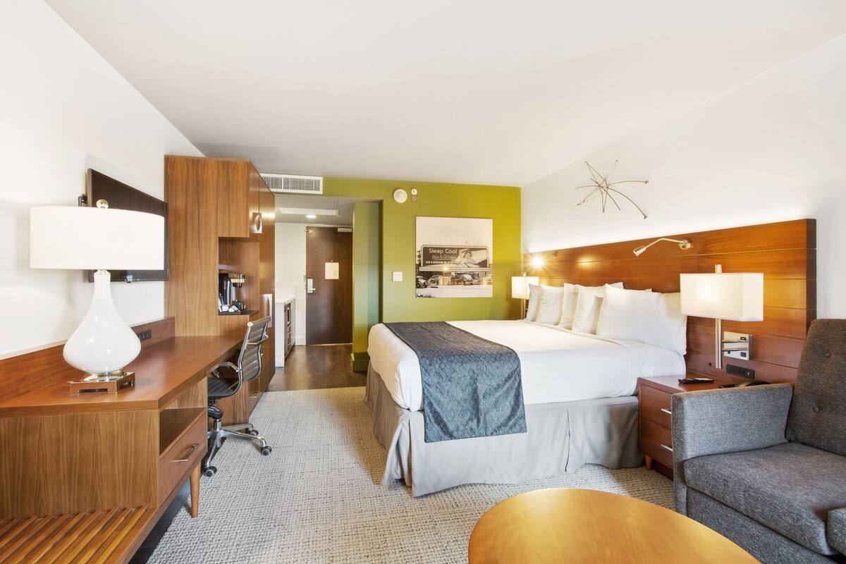 room, 1 king bed, balcony | in-room safe, desk, laptop workspace, blackout curtains