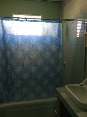 Bathroom shower - MaFlo Arms Apartments (Belize City)