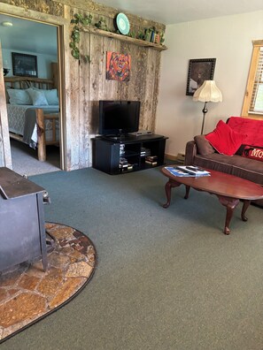 Smart TV, fireplace, DVD player, books