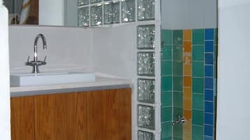 Bathtub, hair dryer, towels, soap