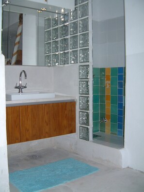 Bathtub, hair dryer, towels, soap