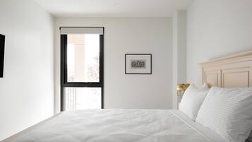 Premium bedding, pillow-top beds, free minibar, in-room safe