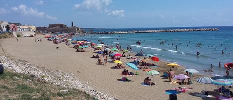 Solsenger og strandhåndklær