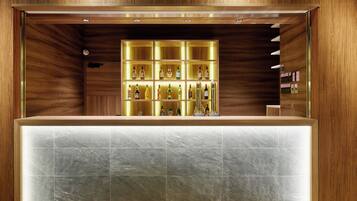 A bar area with a wooden interior and a tiled counter.
