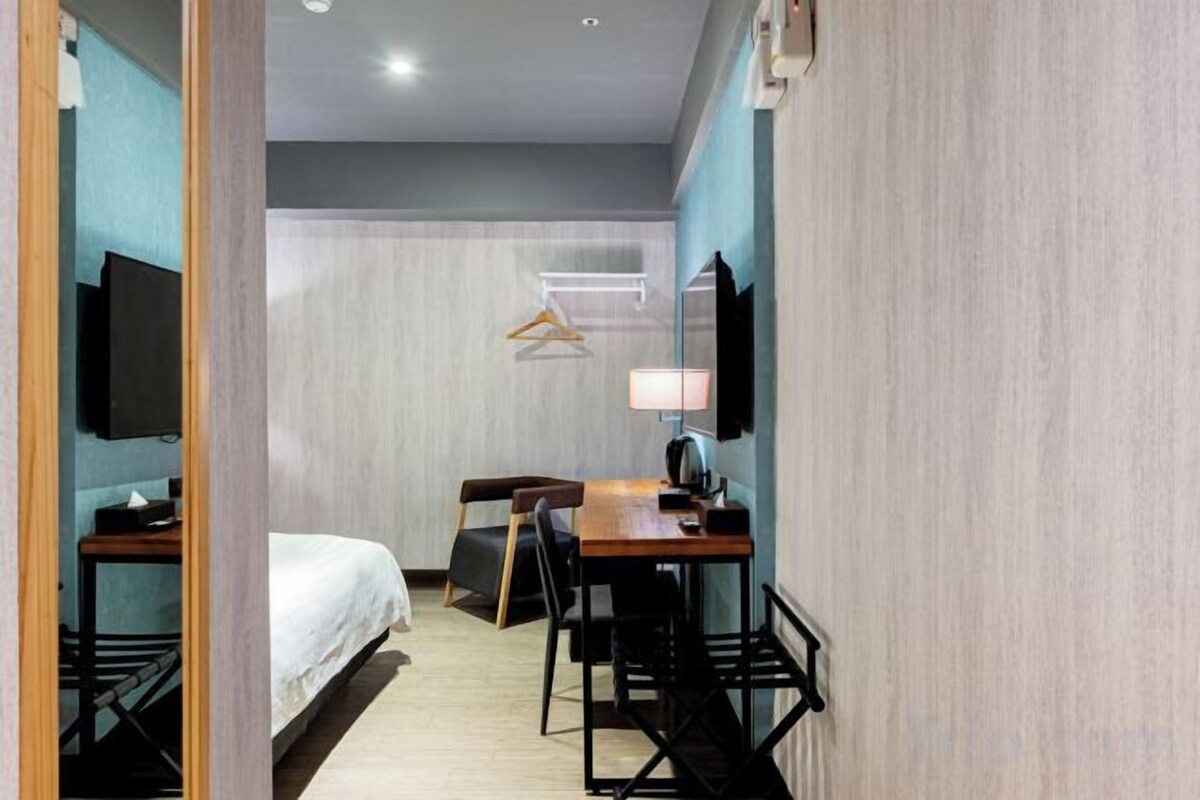 Luxe beddengoed, een bureau, verduisterende gordijnen, gratis wifi