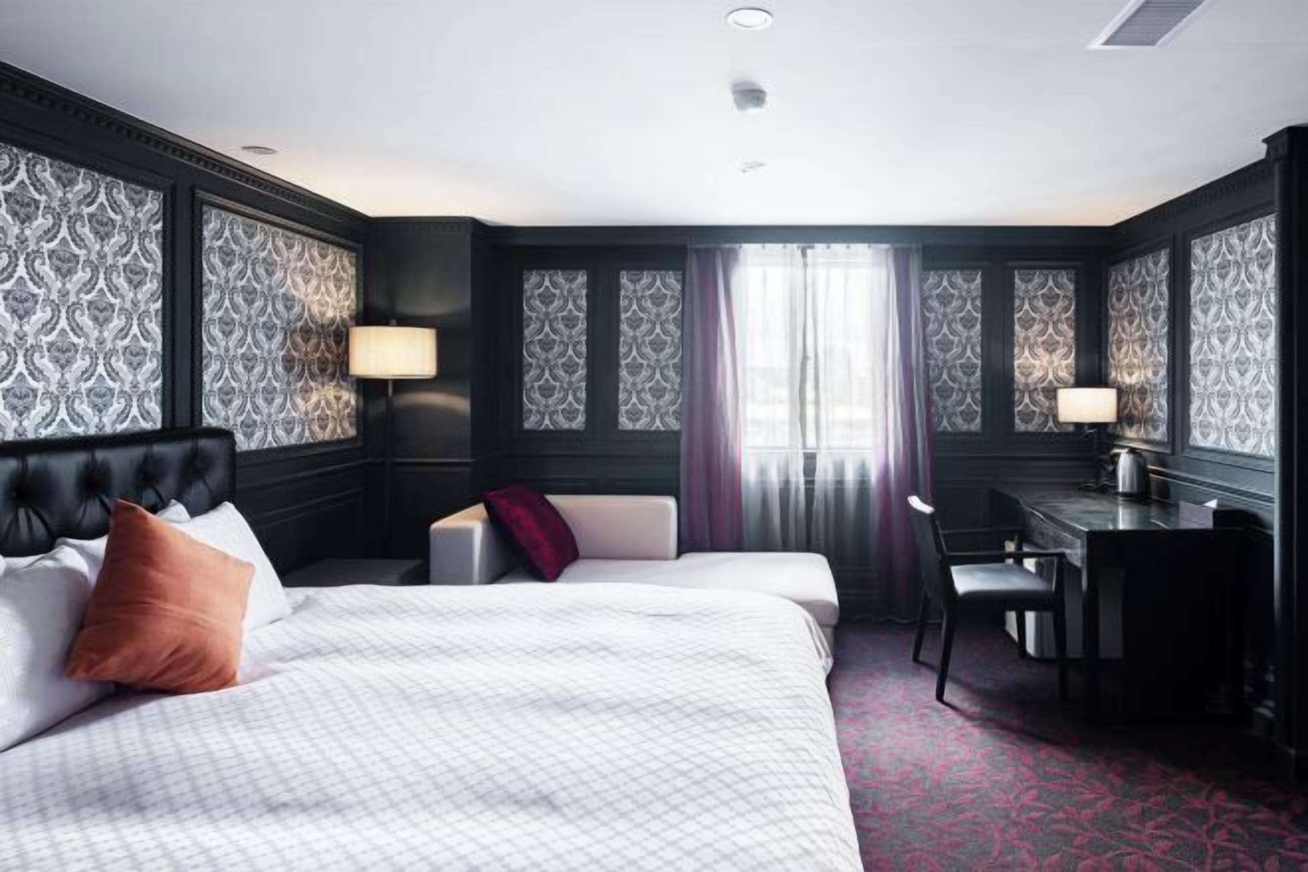 Premium bedding, desk, blackout drapes, free WiFi