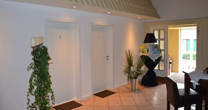Newly built holiday apartment in a modern country house style. 10 min cycle path to the beach