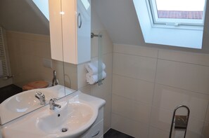 Shower, towels, soap, toilet paper