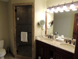 Bathtub, jetted tub, hair dryer, towels