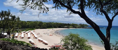 On the beach, sun-loungers, beach towels
