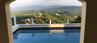 Amazing views from this Mid-Island Villa with swim up pool bar. 10% discount