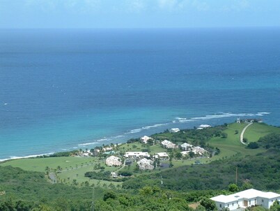 Amazing views from this Mid-Island Villa with swim up pool bar. 10% discount