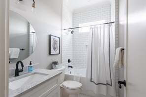 Hair dryer, towels, soap, shampoo