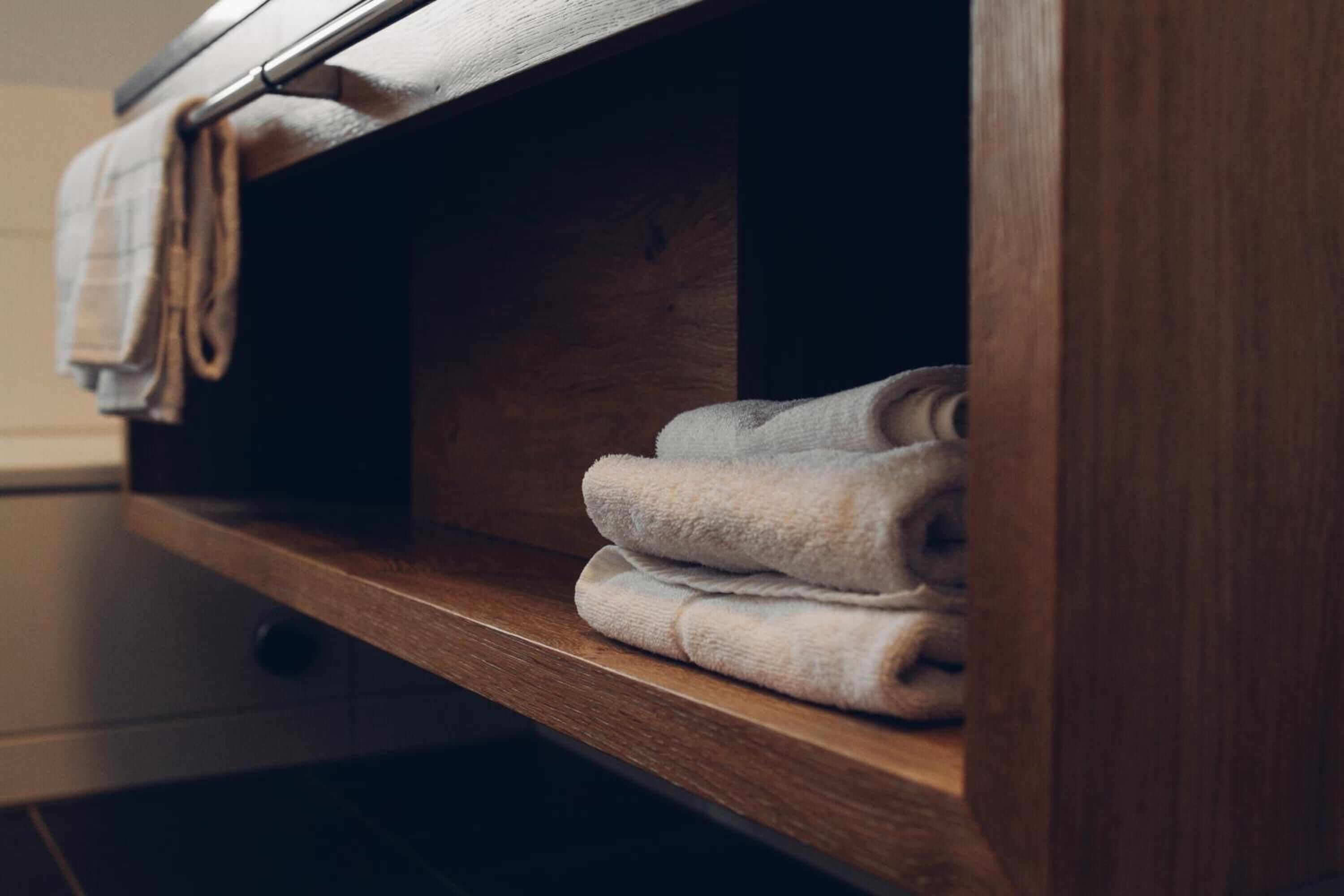 shower, free toiletries, slippers, towels